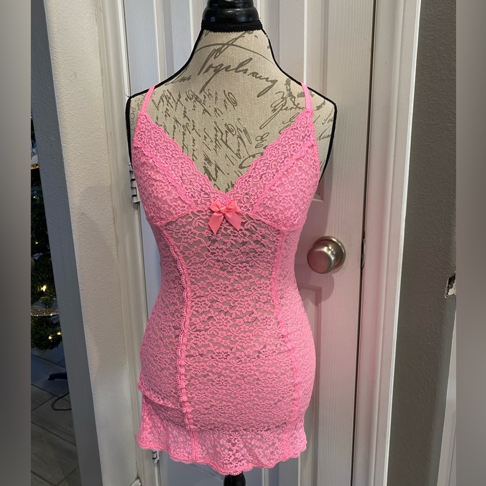 Pink Victorias Secret babydoll with adjustable straps and a bow in the middle